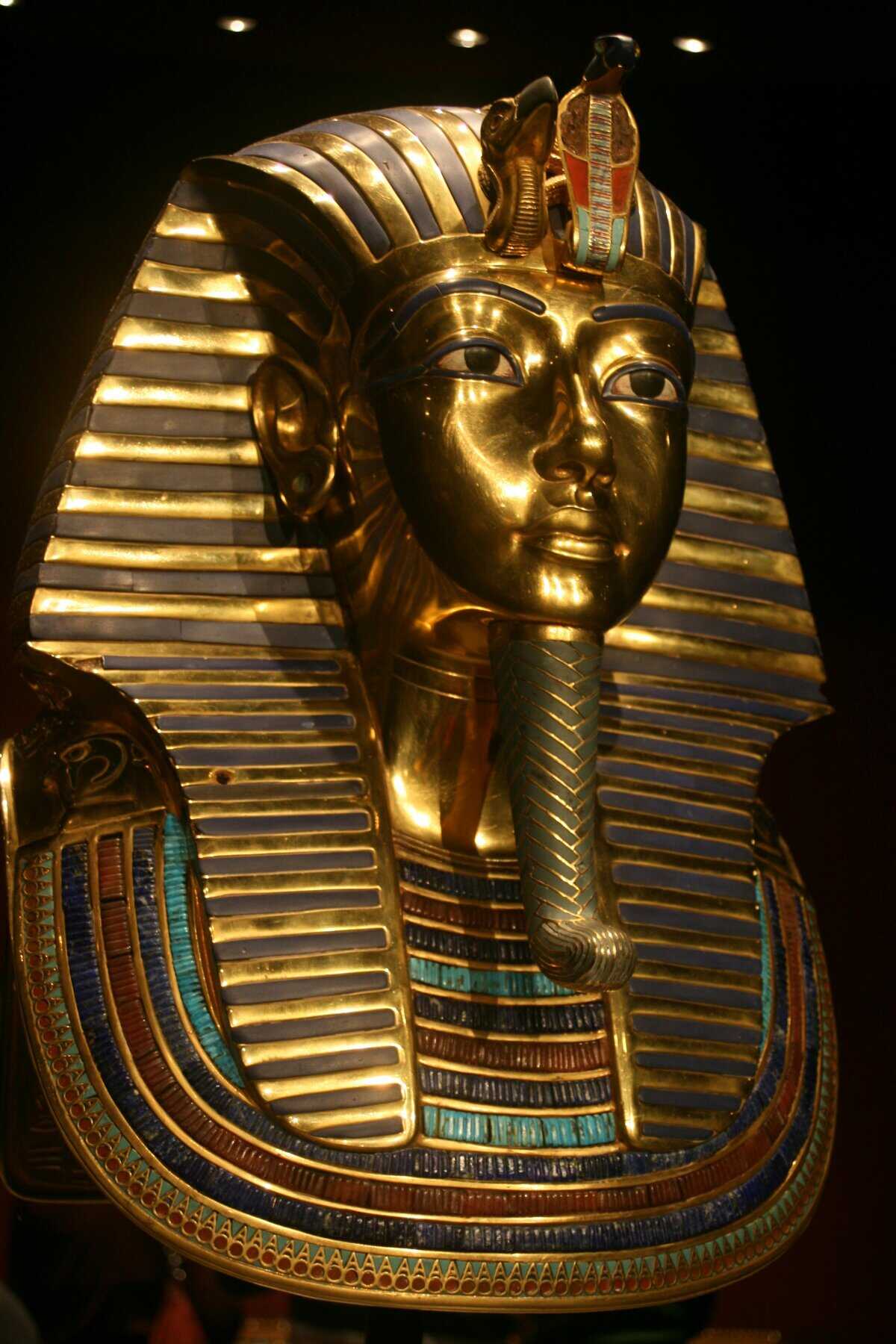 Close-up of King Tutankhamun's famous golden mask, a symbol of ancient Egyptian royalty.